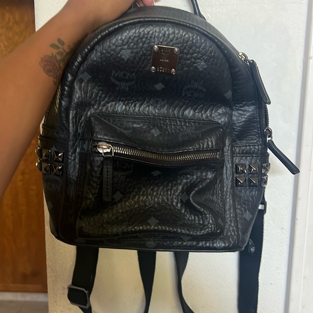 Black studded MCM backpack